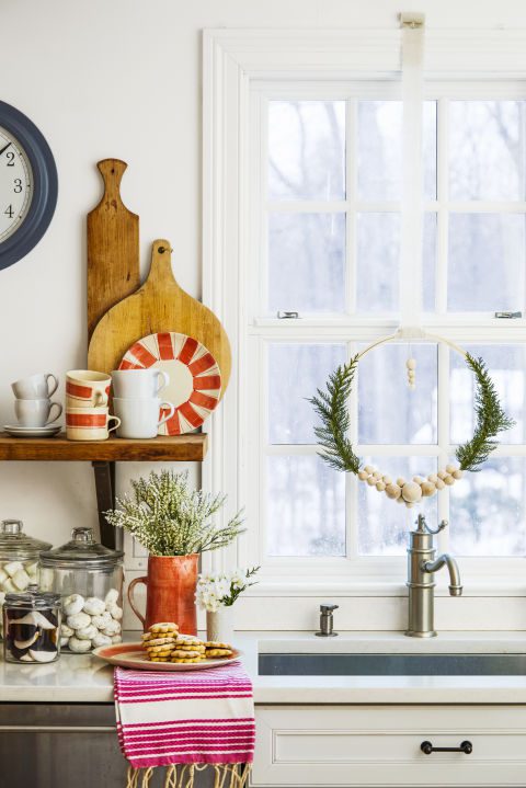 Fancy up your view with a unique wreath made from an embroidery hoop or a garland of lush greenery. What you'll need: embroidery hoop&nbsp;($9,&nbsp;amazon.com), glue gun&nbsp;($11,&nbsp;amazon.com) 