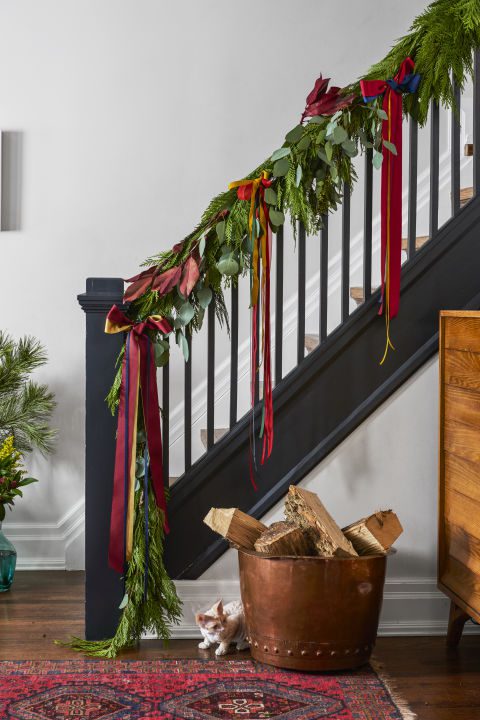 Line a banister with a fresh pine garland and crimson bows. Better yet, stir up some paint in a dramatic hue for a merry makeover you'll love even after the holidays. What you'll need: ribbon ($23, amazon.com) 