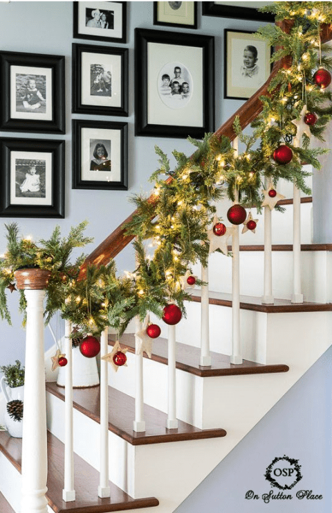 Using different shapes and sizes, add Christmas ornaments to your banister's garland. See more at On Sutton Place » What you'll need:&nbsp;garland&nbsp;($20,&nbsp;amazon.com), ornaments&nbsp;($9,&nbsp;amazon.com) 